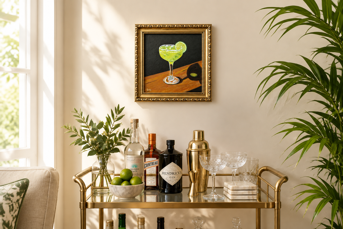 Margarita painting above a home bar cart