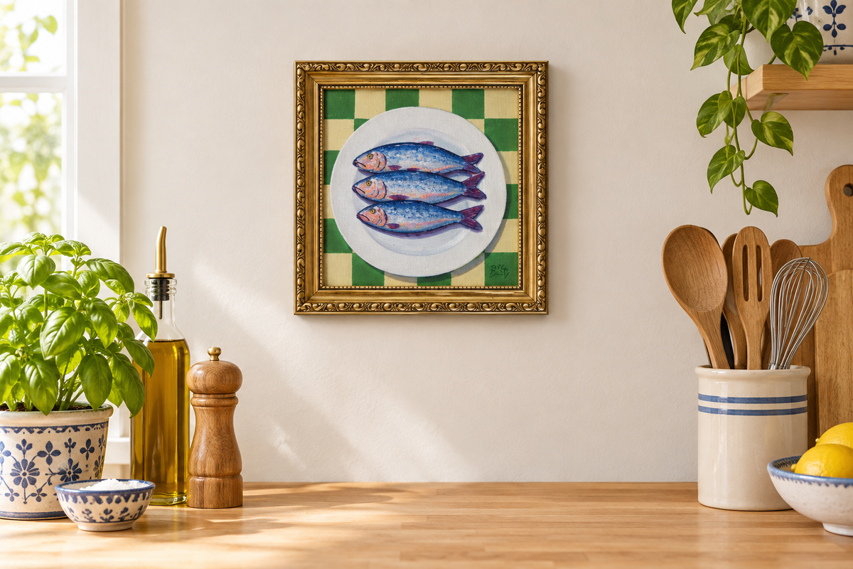 Three sardines painting with heads left on a kitchen wall